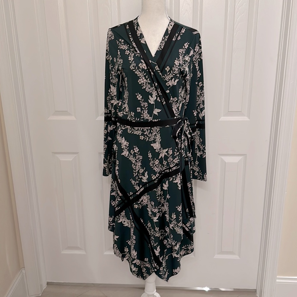 Stunning hunter green wrap dress with soft pink flowers & black accents. BCBG